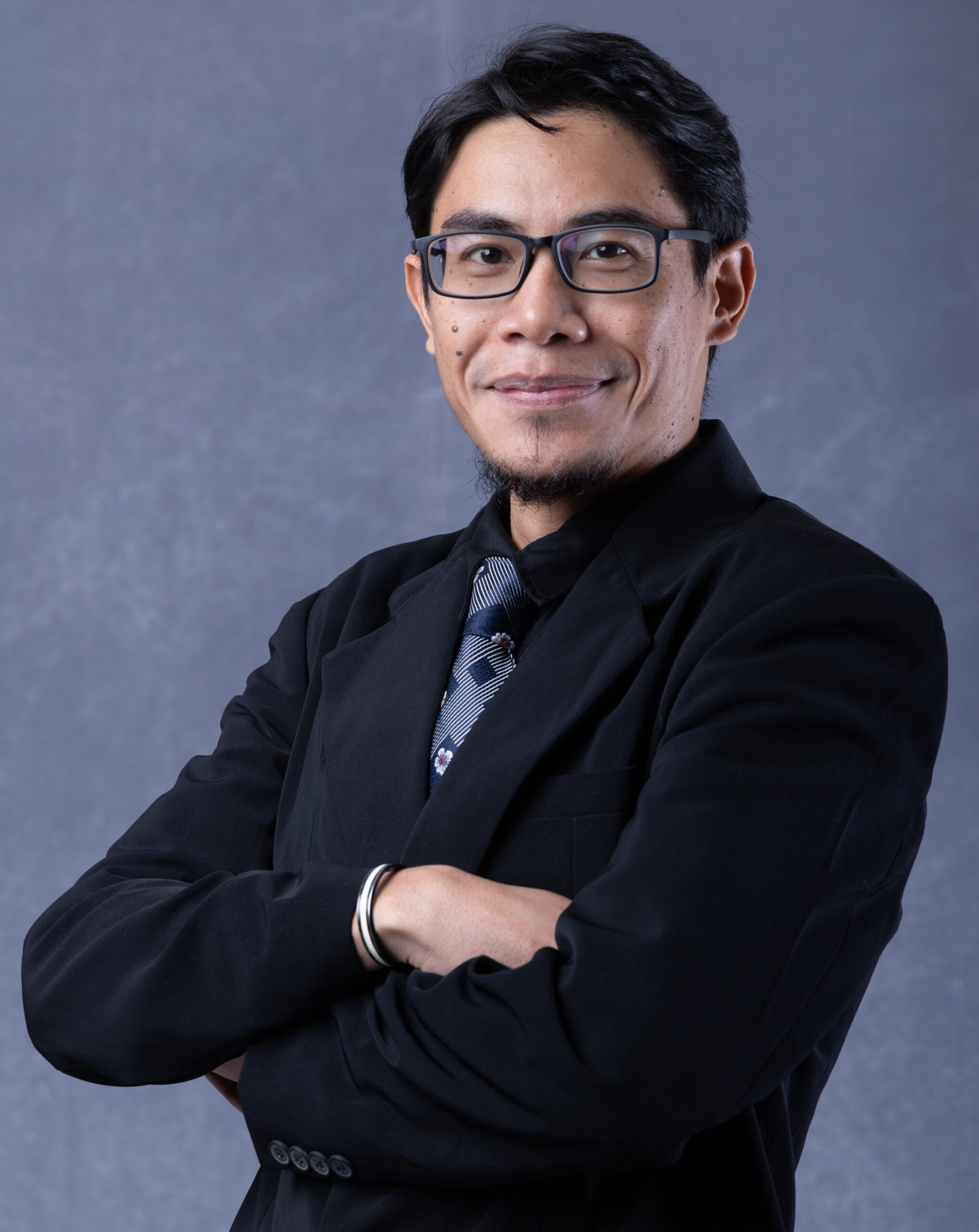 Dr. Octojaya Abriyoso, S.I.Kom., M.M.